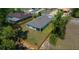 Aerial view of a single Gathering home with fenced in backyard and green lawn at 1664 Sw 167Th St, Ocala, FL 34473