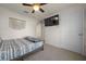 Bedroom with full-size bed and built-in shelving at 1664 Sw 167Th St, Ocala, FL 34473