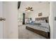 Cozy bedroom with queen bed and large window at 1664 Sw 167Th St, Ocala, FL 34473
