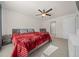 Main bedroom with king bed and en-suite bathroom access at 1664 Sw 167Th St, Ocala, FL 34473