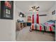 Bedroom with a full bed, desk, and ceiling fan at 1664 Sw 167Th St, Ocala, FL 34473