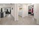 Hallway view showing laundry room and living room at 1664 Sw 167Th St, Ocala, FL 34473