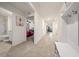 Bright hallway with tile floors and access to bedrooms and living areas at 1664 Sw 167Th St, Ocala, FL 34473