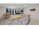 Eat-in kitchen with granite island and view into living room at 1664 Sw 167Th St, Ocala, FL 34473