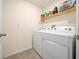 Laundry room with washer, dryer and shelving at 1664 Sw 167Th St, Ocala, FL 34473