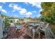 Brick patio with outdoor seating and fire pit, perfect for entertaining at 2004 Ne 52Nd St, Ocala, FL 34479