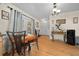 Cozy dining area with a table and chairs, adjacent to kitchen at 2004 Ne 52Nd St, Ocala, FL 34479