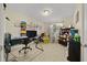 Bright office space with a desk, chair, and storage at 2004 Ne 52Nd St, Ocala, FL 34479