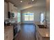 Well-equipped kitchen with granite countertops, stainless steel appliances, and ample cabinet space at 2142 Nw 23Rd Loop, Ocala, FL 34475
