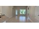 Spacious living area featuring ceramic tile floors and large windows at 2146 Nw 23Rd Loop, Ocala, FL 34475
