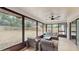 Spacious screened porch overlooking backyard at 21668 Sw Peach Blossom St, Dunnellon, FL 34431