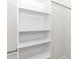 Spacious closet with hanging rod and multiple shelves at 218 Nw 9Th Ave, Ocala, FL 34475