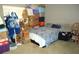 Small bedroom with a double bed and many boxes at 221 Locust Ln, Ocala, FL 34472