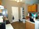 Kitchen features wood cabinets and a pantry at 221 Locust Ln, Ocala, FL 34472
