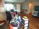 Living area with laminate flooring and access to other rooms at 221 Locust Ln, Ocala, FL 34472