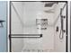 Updated bathroom with a walk-in shower, pebble floor, and modern fixtures at 4343 Nw 80Th Ave # 4, Ocala, FL 34482