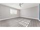 Spacious bedroom with ceiling fan and window at 4343 Nw 80Th Ave # 4, Ocala, FL 34482