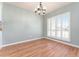 Light and airy dining room with large windows and wood floors at 4343 Nw 80Th Ave # 4, Ocala, FL 34482
