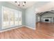 Dining area with view into living room and fireplace at 4343 Nw 80Th Ave # 4, Ocala, FL 34482