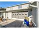 House exterior showing garage with screen doors and potted plants at 4343 Nw 80Th Ave # 4, Ocala, FL 34482