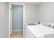 Bright laundry room with washer and dryer and extra storage at 4343 Nw 80Th Ave # 4, Ocala, FL 34482