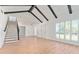 Spacious living room featuring hardwood floors and a staircase at 4343 Nw 80Th Ave # 4, Ocala, FL 34482