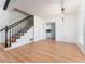 Bright living room with hardwood floors and a staircase at 4343 Nw 80Th Ave # 4, Ocala, FL 34482