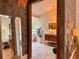Stylish bathroom viewed from hallway, featuring modern fixtures and elegant design elements at 4400 Sw 20Th Ave, Ocala, FL 34471