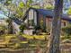 A charming exterior elevation of a well-maintained home with mature trees at 4400 Sw 20Th Ave, Ocala, FL 34471