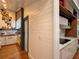Modern kitchen featuring custom cabinets, quartz countertops, and wood-look floors at 4400 Sw 20Th Ave, Ocala, FL 34471