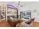 Open-concept living room features a stylish bar area, opening to an outdoor living space at 4400 Sw 20Th Ave, Ocala, FL 34471