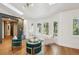 Cozy living room with bright windows and stylish furniture, perfect for relaxation at 4400 Sw 20Th Ave, Ocala, FL 34471