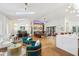 Open concept living space with skylights, dining area, and modern bar at 4400 Sw 20Th Ave, Ocala, FL 34471