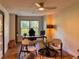 Bright office space with hardwood floors, a ceiling fan, and a backyard view at 4400 Sw 20Th Ave, Ocala, FL 34471