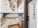 Pantry with unique tile backsplash, herringbone countertops and a door labeled 'Pantry' at 4400 Sw 20Th Ave, Ocala, FL 34471