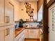 Spacious pantry with custom cabinets, open shelving, and wood countertops at 4400 Sw 20Th Ave, Ocala, FL 34471