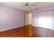 Cozy bedroom with hardwood floors and a closet at 4542 Ne 4Th St, Ocala, FL 34470