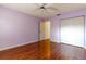 Inviting bedroom with hardwood floors, closet space, and a soft color palette at 4542 Ne 4Th St, Ocala, FL 34470