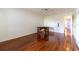 Spacious bedroom with hardwood floors and a ceiling fan at 4542 Ne 4Th St, Ocala, FL 34470