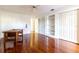 Spacious bedroom with wood floors and ample closet space at 4542 Ne 4Th St, Ocala, FL 34470