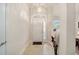 Clean and simple entryway with white door and chandelier at 4585 Sw 112Th Ln, Ocala, FL 34476