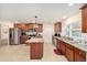 Updated kitchen with stainless steel appliances and an island at 4585 Sw 112Th Ln, Ocala, FL 34476