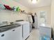 Laundry room with washer, dryer, and exterior access at 4585 Sw 112Th Ln, Ocala, FL 34476