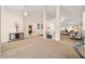 Open and airy living room with high ceilings and a fireplace at 4585 Sw 112Th Ln, Ocala, FL 34476