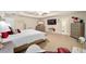Main bedroom with king bed, ensuite bathroom access, and ample space at 4585 Sw 112Th Ln, Ocala, FL 34476