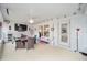 Bright screened porch with outdoor seating and access to backyard at 4585 Sw 112Th Ln, Ocala, FL 34476