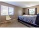Spacious bedroom with a large bed and plenty of natural light at 512 Bahia Cir # 512B, Ocala, FL 34472