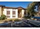 Condo building exterior with parking and landscaping at 512 Bahia Cir # 512B, Ocala, FL 34472
