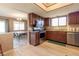 Kitchen with stainless steel appliances and view into dining area at 512 Bahia Cir # 512B, Ocala, FL 34472