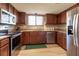 Updated kitchen with stainless steel appliances and granite countertops at 512 Bahia Cir # 512B, Ocala, FL 34472